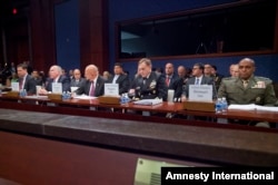 From left, FBI Director James Comey, CIA Director John Brennan, Director of National Intelligence James Clapper, NSA Director Adm. Michael Rodgers, and DIA Director Lt. Gen. Vincent Stewart, appear on Capitol Hill in Washington, Sept. 10, 2015.