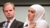 Belgium's Hejare Boujtat, right, testifies, as John Dalhuisen, Europe and Central Asia Deputy Programme Director at Amnesty International, looks at her, during a media conference, at the presentation of a report by Amnesty International called 'Choice and prejudice: discrimination against Muslims in Europe' in Brussels, Tuesday, April 24, 2012. 