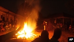In the remote village of Dugba-yeima, hundreds of people gather around a bonfire for "fambul tok" a special reconciliation ceremony where victims and offenders alike speak openly about the atrocities committed in their community during eleven years of civ