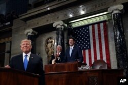 President Donald Trump pauses as delivers his first State of the Union address in the House chamber of the U.S. Capitol to a joint session of Congress, Jan. 30, 2018 in Washington.