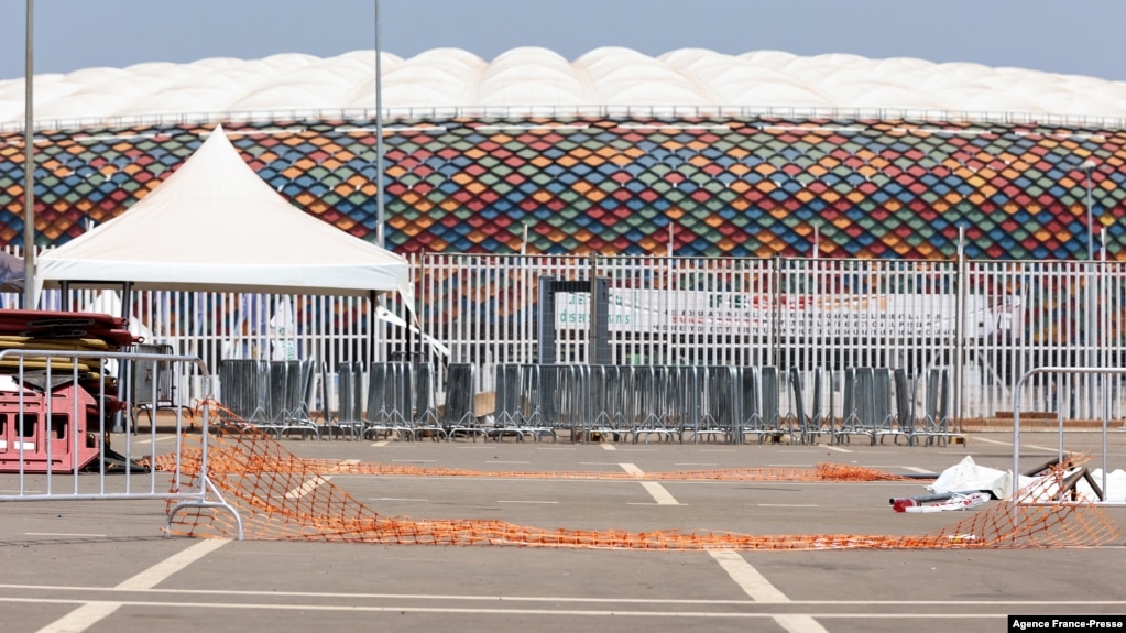 Barriers on the ground at the scene of the stampede are seen at the entrance of Olembe stadium in Yaounde, Jan. 25, 2022. Eight people were killed and many more injured in a crush outside a Cameroonian football stadium, Jan. 24, 2022, before an Africa Cup