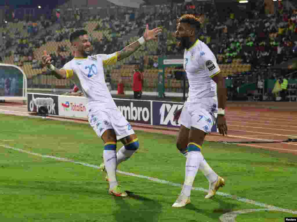 Gabon&#39;s Aaron-Salem Boupendza celebrates scoring their first goal with Denis Bouanga.