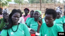 Two of some 60 women that went to school and chose their husbands. (Hannah McNeish/VOA)