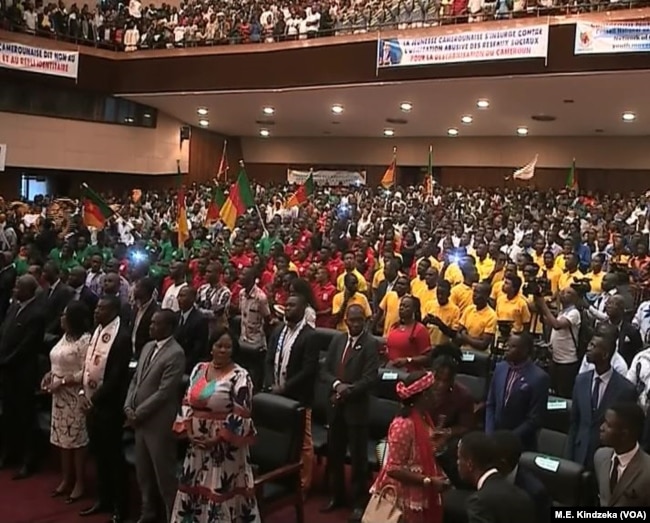 Young supporters, many bussed in from other parts of the country, mark President Paul Biya's birthday, at Yaounde Conference Center, in Yaounde, Cameroon, Feb 13, 2019.