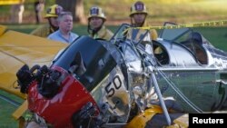 The nose of actor Harrison Ford's vintage airplane shows substantial damage from a crash landing Thursday at Penmar Golf Course in Venice, Calif., March 5, 2015.