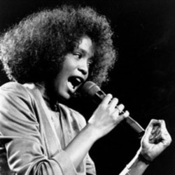 A 22 year-old Whitney Houston performing in Boston, Massachusetts, in 1986