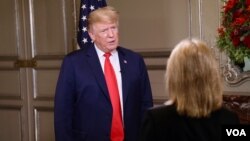 President Donald Trump answers a question from VOA contributor Greta Van Susteren on the sidelines of the G-20 Summit in Buenos Aires, Argentina, Nov. 30, 2018.
