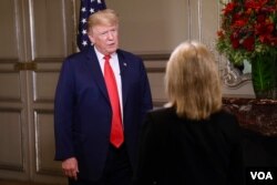 President Donald Trump answers a question from VOA contributor Greta Van Susteren on the sidelines of the G-20 Summit in Buenos Aires, Argentina, Nov. 30, 2018.