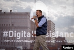 Russian opposition leader Alexei Navalny attends a rally in protest against court decision to block the Telegram messenger, in Moscow, April 30, 2018.