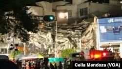 Colonia Roma its one of the areas of Mexico City greatly affected by the earthquake, Sept. 19, 2017. This is an office building where rescuers are trying to get people out of the rubble. Three people were take out alive Wednesday.