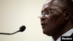 Interim President Jocelerme Privert speaks during his speech at the submission act of the report of a commission set up to re-examine the first round election results at the National Palace in Port-au-Prince, Haiti, May 30, 2016. 