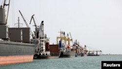 Ships are seen at Hodeida port, Yemen, May 14, 2019. 