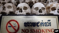 Human skulls are displayed in the stupa of Choeung Ek, a former Khmer Rouge "killing field" dotted with mass graves about nine miles (15 kilometers) south of Phnom Penh, Cambodia.