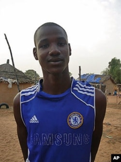 Sixteen-year-old Oumar Alassane Ba is a Senegalese-born, Mauritanian refugee, who is the top student at his community high school and was named best overall student in the region, in Ndioum, Senegal, November 2011.