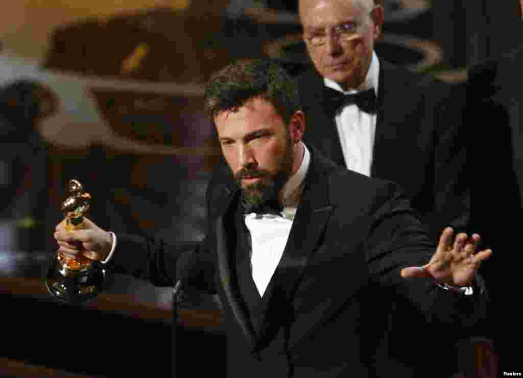 Director and producer Ben Affleck accepts the Oscar for best picture for "Argo" at the 85th Academy Awards in Hollywood, California.