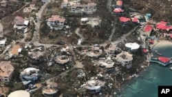 Damage in the aftermath of Hurricane Irma in Virgin Gorda's Leverick Bay in the British Virgin Islands, Sept. 8, 2017. Irma scraped Cuba's northern coast Friday on a course toward Florida, leaving in its wake a ravaged string of Caribbean resort islands s