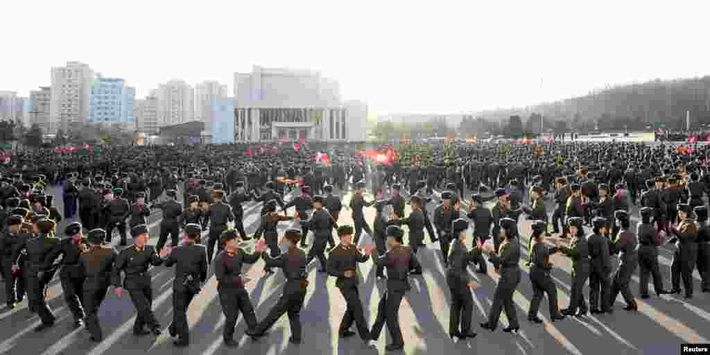 Members of North Korea&#39;s Ministry of the People&#39;s Armed Forces (MPAF) dance during a celebration of the anniversary of the founding of the regular revolutionary armed forces of Korea, at an undisclosed location&nbsp; in Pyongyang in this undated photo released by North Korea&#39;s Korean Central News Agency (KCNA).