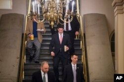 Speaker of the House Paul Ryan, R-Wisconsin, arrives for a meeting of fellow Republicans on the first morning of a government shutdown after a divided Senate rejected a funding measure, at the Capitol in Washington, Jan. 20, 2018.