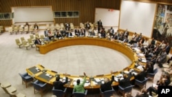 A wide view of the Security Council as members unanimously adopt resolution 2009 (2011), authorizing the deployment of the United Nations Support Mission in Libya, September 16, 2011.