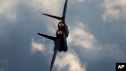 This Dec. 29, 2016, photo shows an Israeli Air Force F-15 plane in flight during a graduation ceremony for new pilots at the Hatzerim air force base near the city of Beersheba, Israel. 