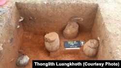 Burial jars at the Plain of Jars in central Laos. 