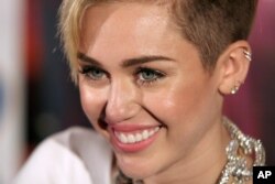 Recording artist Miley Cyrus attends an album release signing event, on Oct. 8, 2013 at Planet Hollywood in New York.