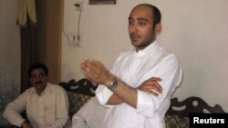 Ali Haider Gilani, son of former Pakistani Prime Minister Yusuf Raza Gilani, who is contesting in the upcoming general election, speaks during a campaign meeting at a house on the outskirts of Multan, May 9, 2013, before his abduction by unidentified gunm