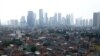 Kabut asap terlihat menyelimuti gedung-gedung di ibu kota Jakarta, 19 Mei 2021. (Foto: REUTERS/Ajeng Dinar Ulfiana)
