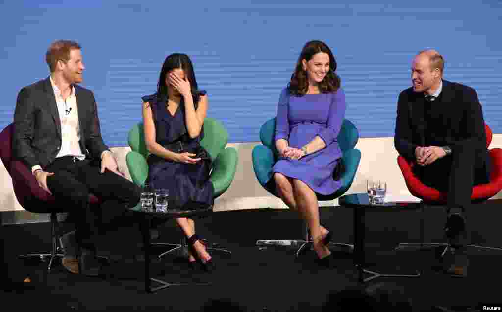 Britain&#39;s Prince Harry, his fiancee Meghan Markle, Prince William and Catherine, Duchess of Cambridge attend the first annual Royal Foundation Forum held at Aviva in London.