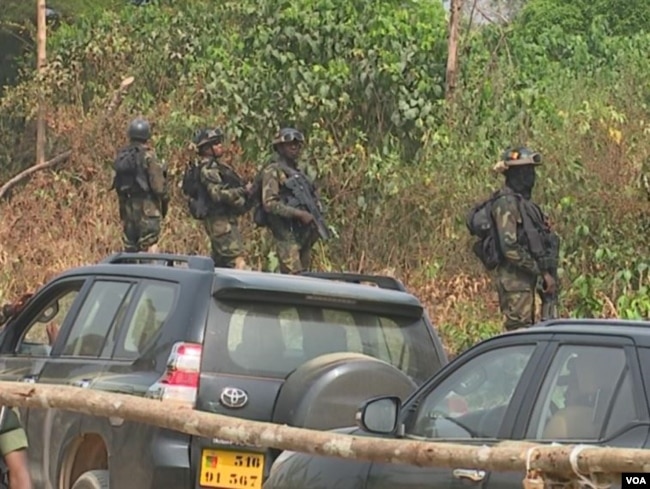 Military protecting government officials visiting Lebialem in South Western Cameroon, Sept. 15, 2018