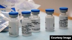 Bottles with Russia's "Sputnik-V" vaccine against the coronavirus disease (COVID-19) are seen before inoculation at a clinic in Tver, Russia October 12, 2020. REUTERS/Tatyana Makeyeva