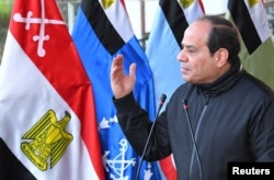 FILE - Egyptian President Abdel Fattah al-Sisi speaks with students during a visit to the Military Academy in Cairo, Egypt, Feb. 19, 2018.