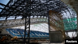 The Fisht Olympic Stadium is pictured under construction for the 2014 Winter Olympic Games in Sochi, Aug. 20, 2013. 