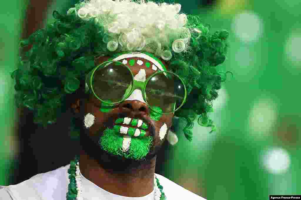 A Nigeria supporter poses prior to the round of 16 football match between Nigeria and Tunisia in Garoua, Cameroon on Jan. 23, 2022.