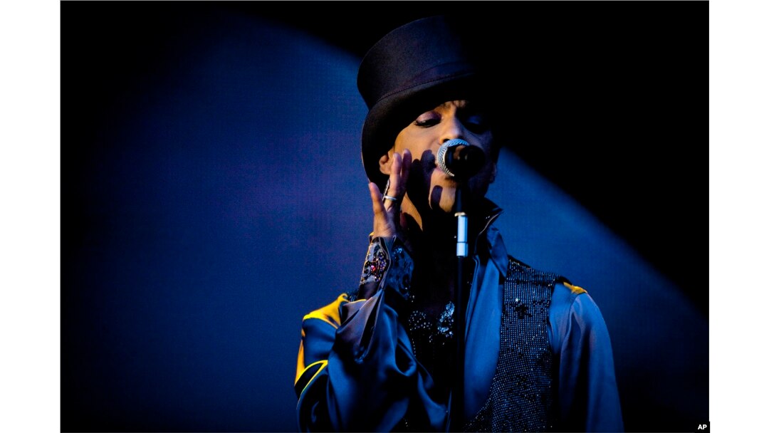 American singer and songwriter Prince performs on the Isle of Amager in Copenhagen, Denmark, Aug. 6, 2011.