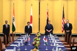 印度外长苏杰生、日本外相茂木敏充、澳大利亚外长佩恩和美国国务卿蓬佩奥在东京举行四方会谈。（2020年10月6日）