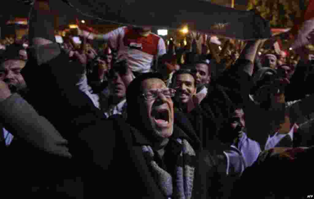 A protester shouts prior to the televised speech of Egyptian President Hosni Mubarak, in which they believed he would step down, at the continuing anti-government demonstration in Cairo, Egypt Thursday, Feb. 10, 2011. Mubarak refused to step down or leav