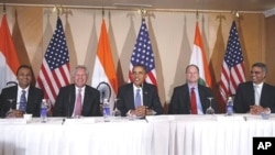 President Barack Obama seated with, from left to right, Anil Ambani of Reliance Anil Dhirubhai Ambani, General Electric's Jeffrey Immelt, Boeing's Christopher Chadwick, Bhupendra Khansagra of India's Spice Jet, as he holds a roundtable discussion with CEO