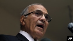 Egyptian presidential candidate Ahmed Shafiq speaks to the media during a press conference at his office in Cairo, Egypt, Saturday, May 26, 2012.