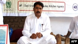 FILE - A photograph taken on July 22, 2010, shows Pakistani doctor Shakil Afridi, who helped the U.S. locate al-Qaida leader Osama bin Laden, attending a Malaria control campaign in Pakistan's Khyber tribal district.