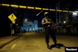 Security forces stand guard at St. Antony shrine, days after a string of suicide bomb attacks on churches and luxury hotels across the island on Easter Sunday, in Colombo, Sri Lanka, April 24, 2019.