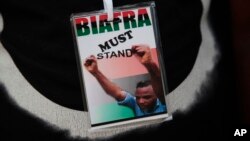 A member of the Biafran separatist movement wears a badge supporting their cause during an event in Umuahia, Nigeria, May 28, 2017.