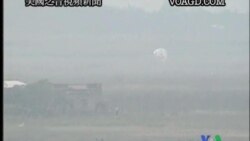 2011-10-14 美國之音視頻新聞: 一架戰鬥機在中國航空展墜毀