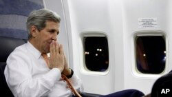 U.S. Secretary of State John Kerry speaks to journalists about his negotiations with Iran upon his arrival from Vienna at Andrews Air Force Base, Md., Jan. 17, 2016. 