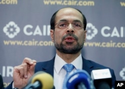 Council on American-Islamic Relations (CAIR) national executive director Nihad Awad speaks during a news conference at CAIR offices, in Washington, Jan. 30, 2017. Awad has called President Donald Trump's retweeting of the videos "unconscionable and irresponsible."