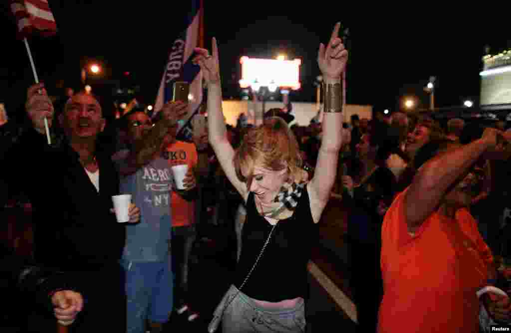 People celebrate after the announcement of the death of Cuban revolutionary leader Fidel Castro in the Little Havana district of Miami, Florida, U.S. November 26, 2016. 