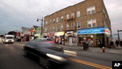 Arabic writing is seen store signs along Main Street in Paterson, N.J., Nov. 1, 2017.