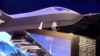 资料照：为中航技进出口有限公司制作的翼龙2武器化无人机模型在阿联酋阿布扎比的一次军用无人机会议上参展。(2018年2月25日)