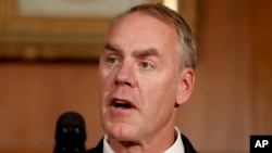 FILE - Interior Secretary Ryan Zinke speaks at the Interior Department in Washington, April 26, 2017.