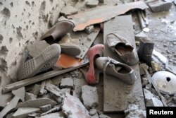 Shoes are pictured in a house damaged by shelling during the fighting between the eastern forces and internationally recognized government is pictured in Abu Salim in Tripoli, Libya, April 15, 2019.